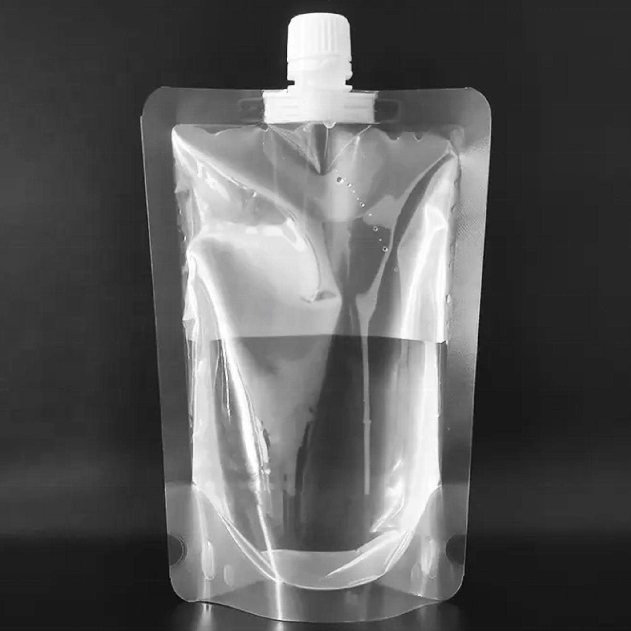 Stand-up clear poly pouch with spout made from PET + PE, food-grade and freezer-safe